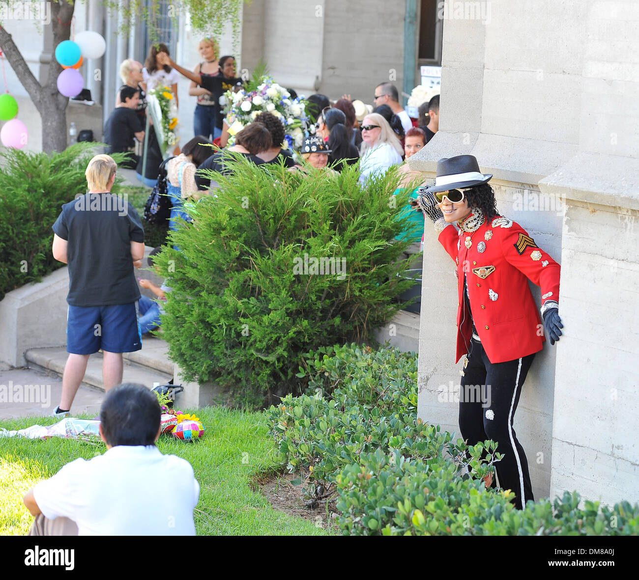 Fans visit Michael Jackson's tomb at Forest Lawn Cemetery on what would have been his 53rd