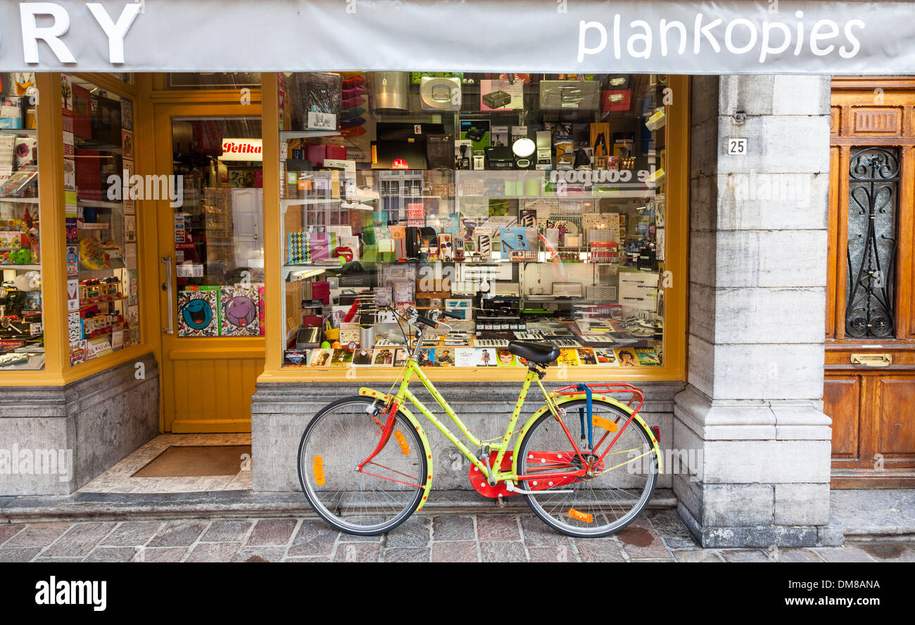 Brightly coloured bicycle outside a shop in Ypres, Belgium Stock Photo