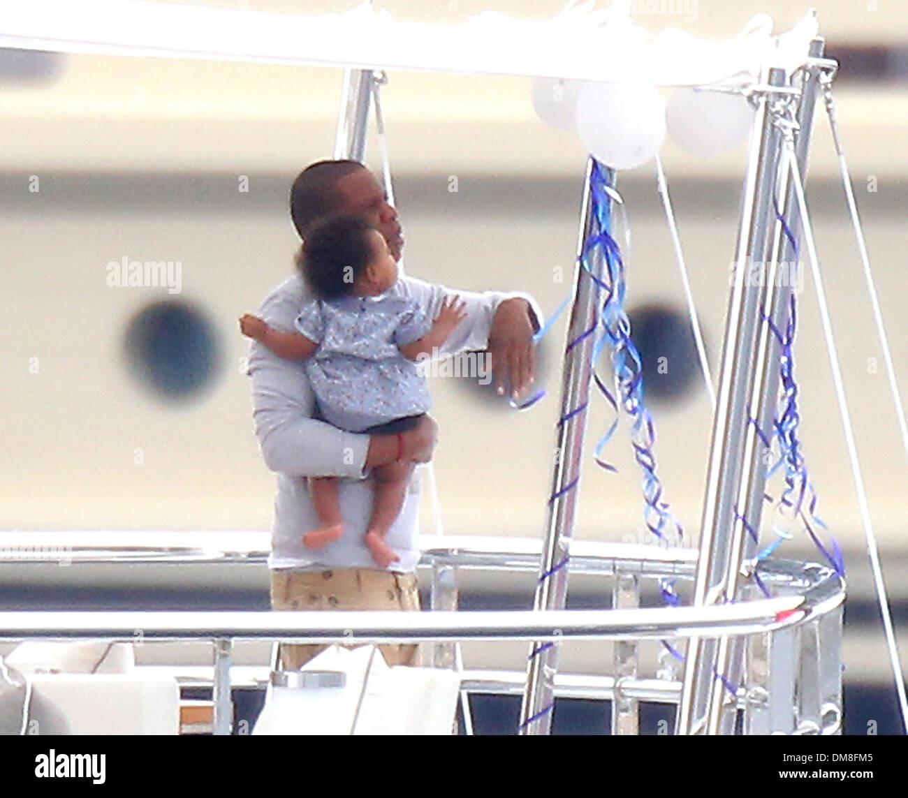 Beyonce and husband Jay-Z with their seven-month-old daughter Blue Ivy ...