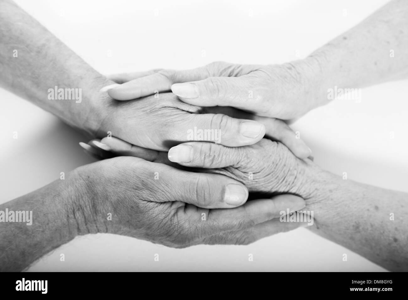 Elderly man & woman with hands locked together Stock Photo Alamy