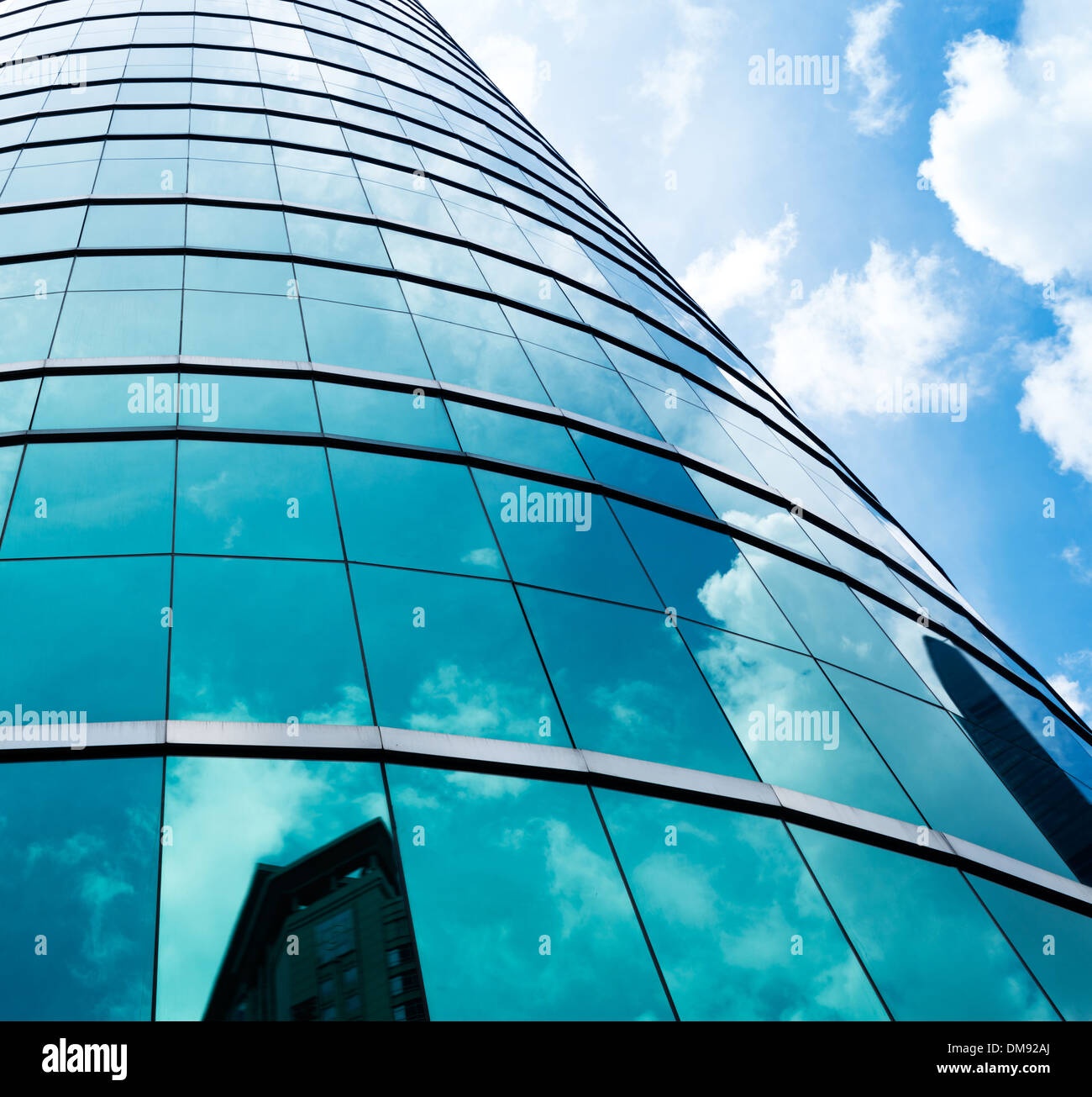 Modern business building with sky reflection Stock Photo - Alamy