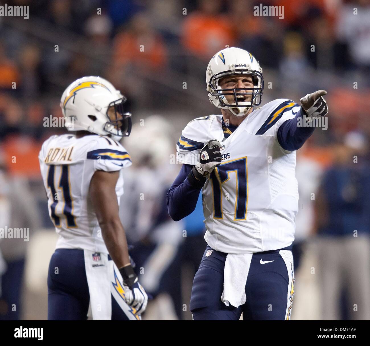 Denver, Colorado, USA. 12th Dec, 2013. Chargers QB PHILIP RIVERS, right, yells at a ref that he is being grabbed at after his pass completion during the first half at Sports Authority Field at Mile High Thursday evening. The Chargers beat the Broncos 27-20. Credit:  Hector Acevedo/ZUMAPRESS.com/Alamy Live News Stock Photo