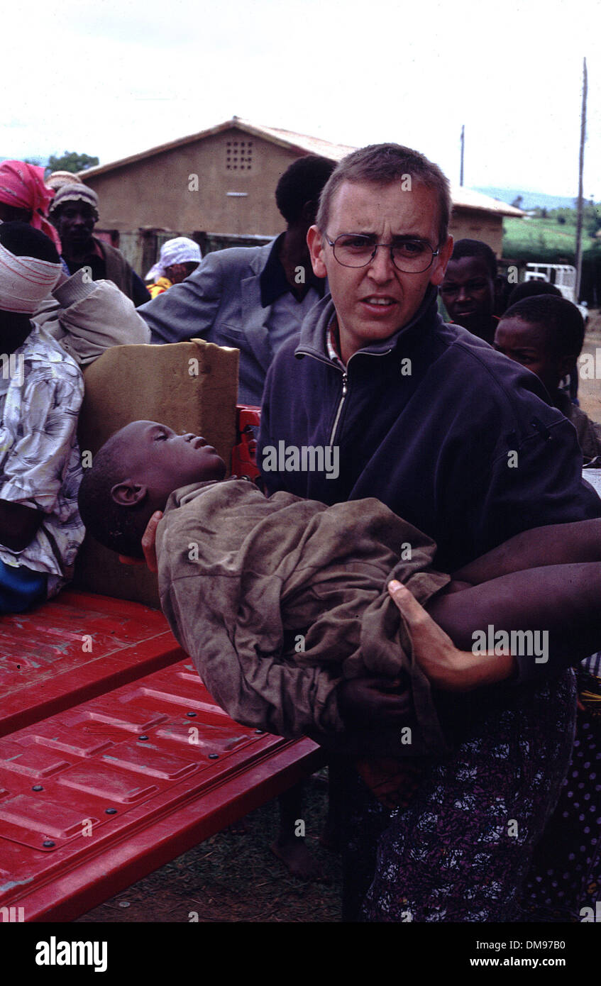 Apr 08, 1994 - Burundi, Rwanda - Young wounded child is carried by MSF ...