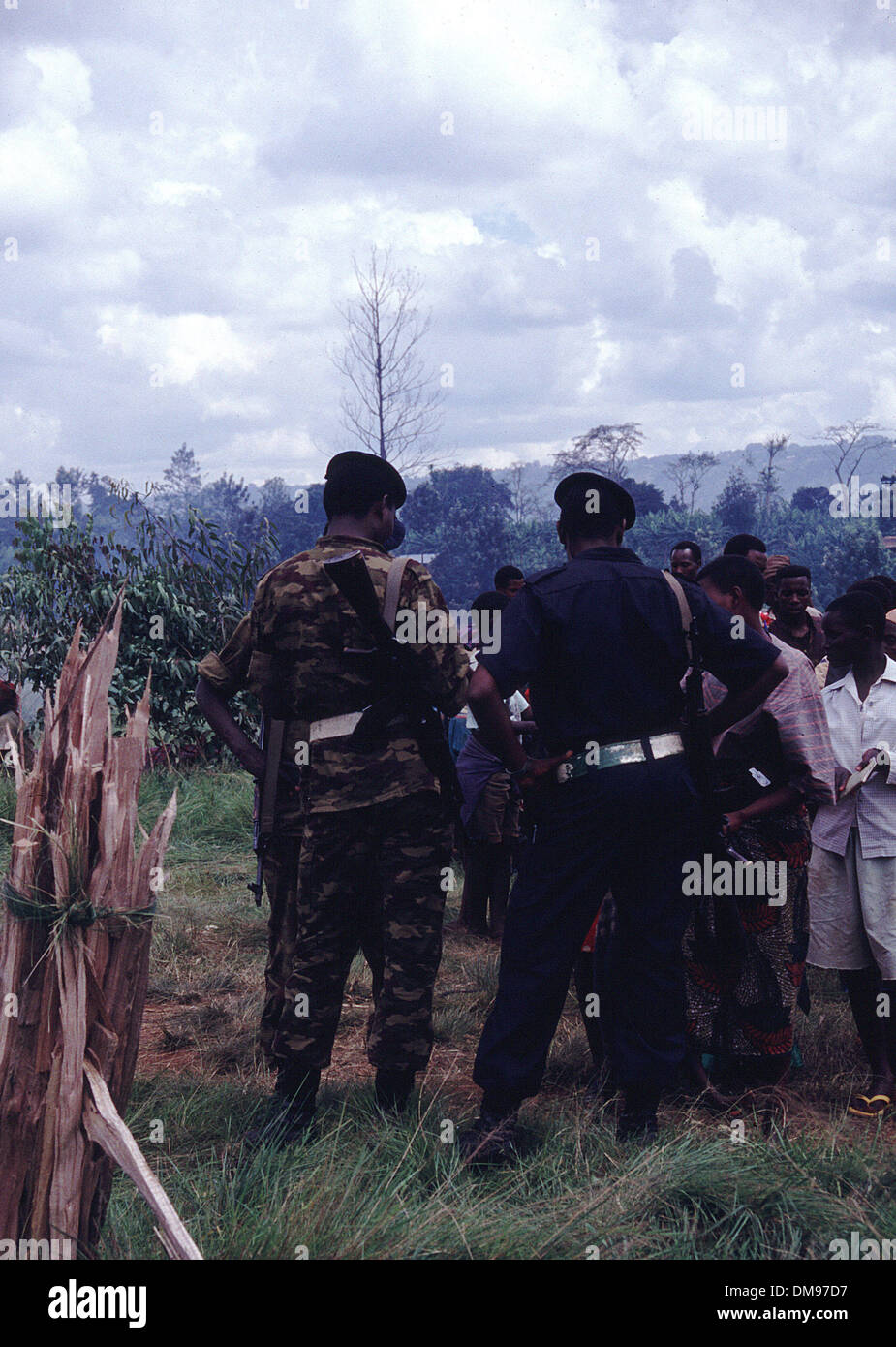 Apr 08, 1994 - Burundi, Rwanda - Burundi authorities try to check documents as Rwandan Tutsi refugees flee across the border into Burundi in April 1994 as the Hutus commited genocide in a 100 day civil war. The Rwandan Genocide was the 1994 mass murder of an estimated 800,000 people in the small East African nation of Rwanda. Over the course of approximately 100 days from the assas Stock Photo