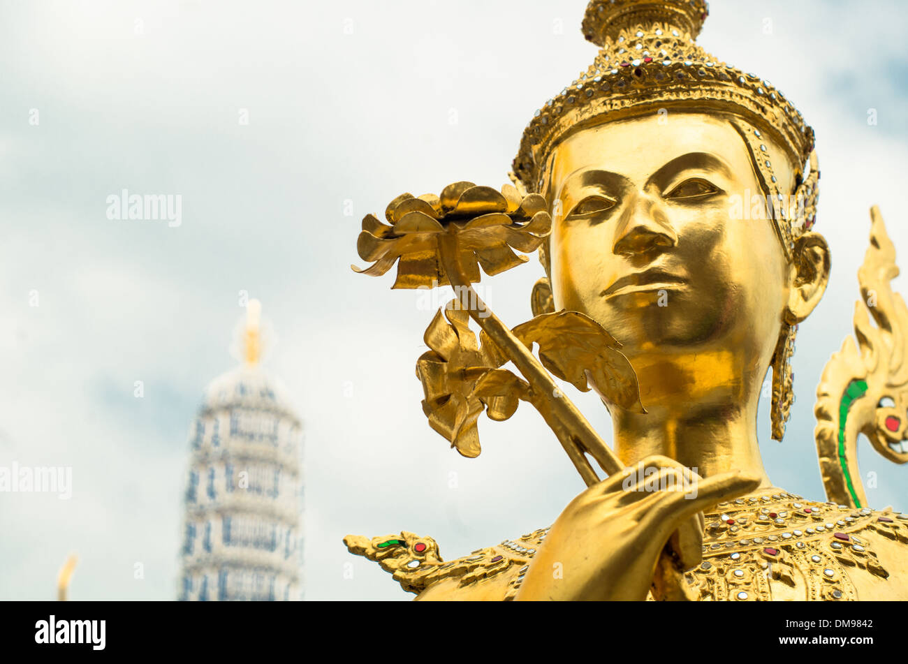 Kinnara statue in Wat Phra Kaew or Temple of the Emerald Buddha in Bangkok Grand palace. Stock Photo