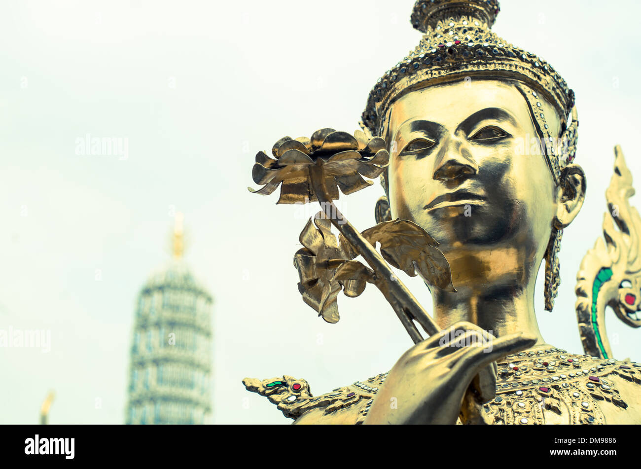 Kinnara statue in Wat Phra Kaew or Temple of the Emerald Buddha in Bangkok Grand palace. Stock Photo