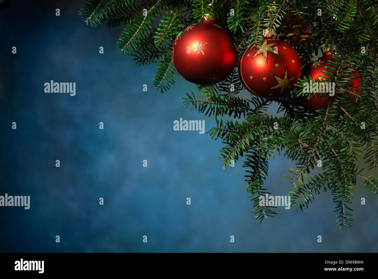 Christmas balls on a gold background Stock Photo - Alamy