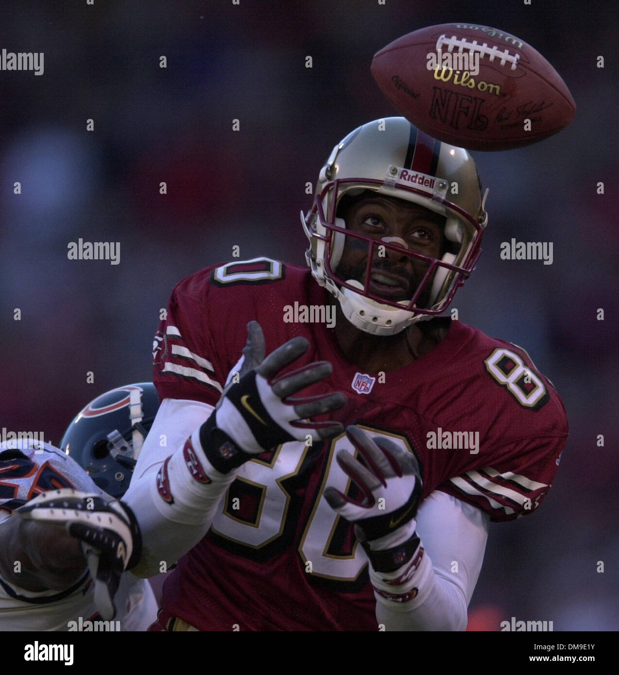 San Francisco 49er Jerry Rice is unable to hold on to this pass thrown ...