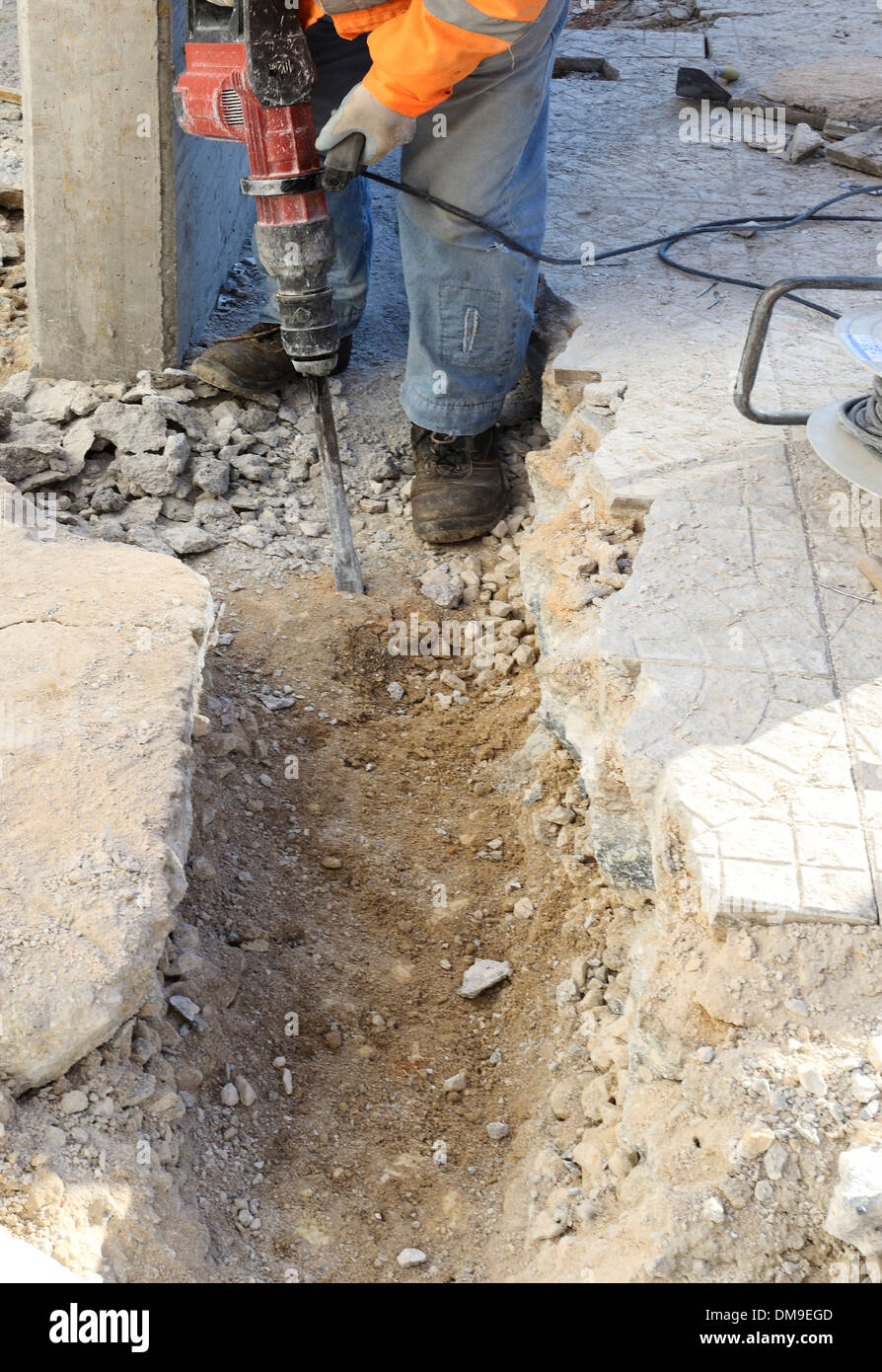 Construction site worker using Jackhammer Stock Photo Alamy