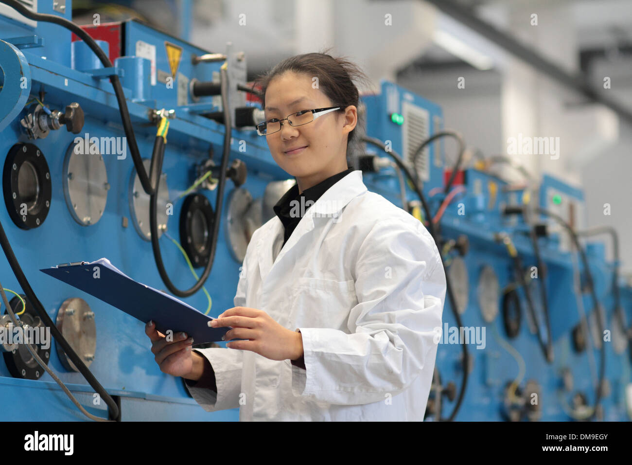An Asia young woman working as a scientist in a technology lab Stock Photo