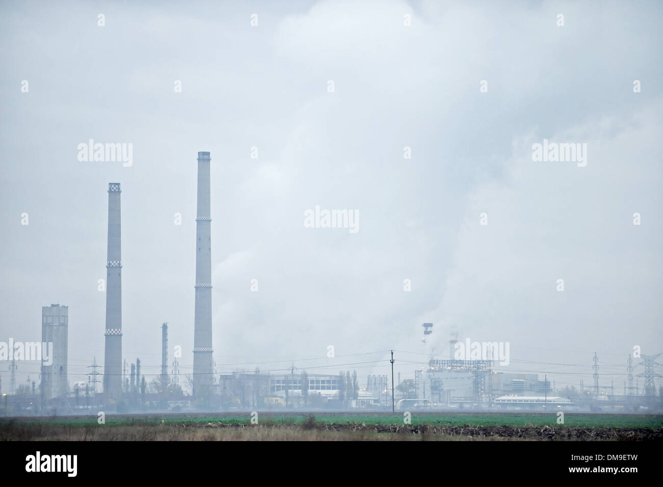 Industrial landscape with petrochemical plant early in the morning Stock Photo