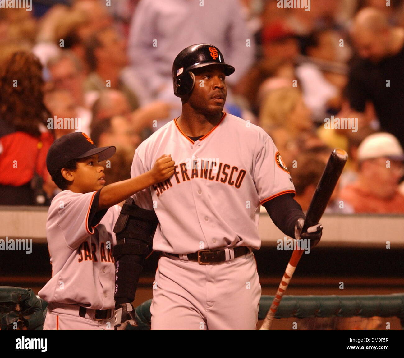San Francisco Giants slugger Barry Bonds gets a pat on the chest from