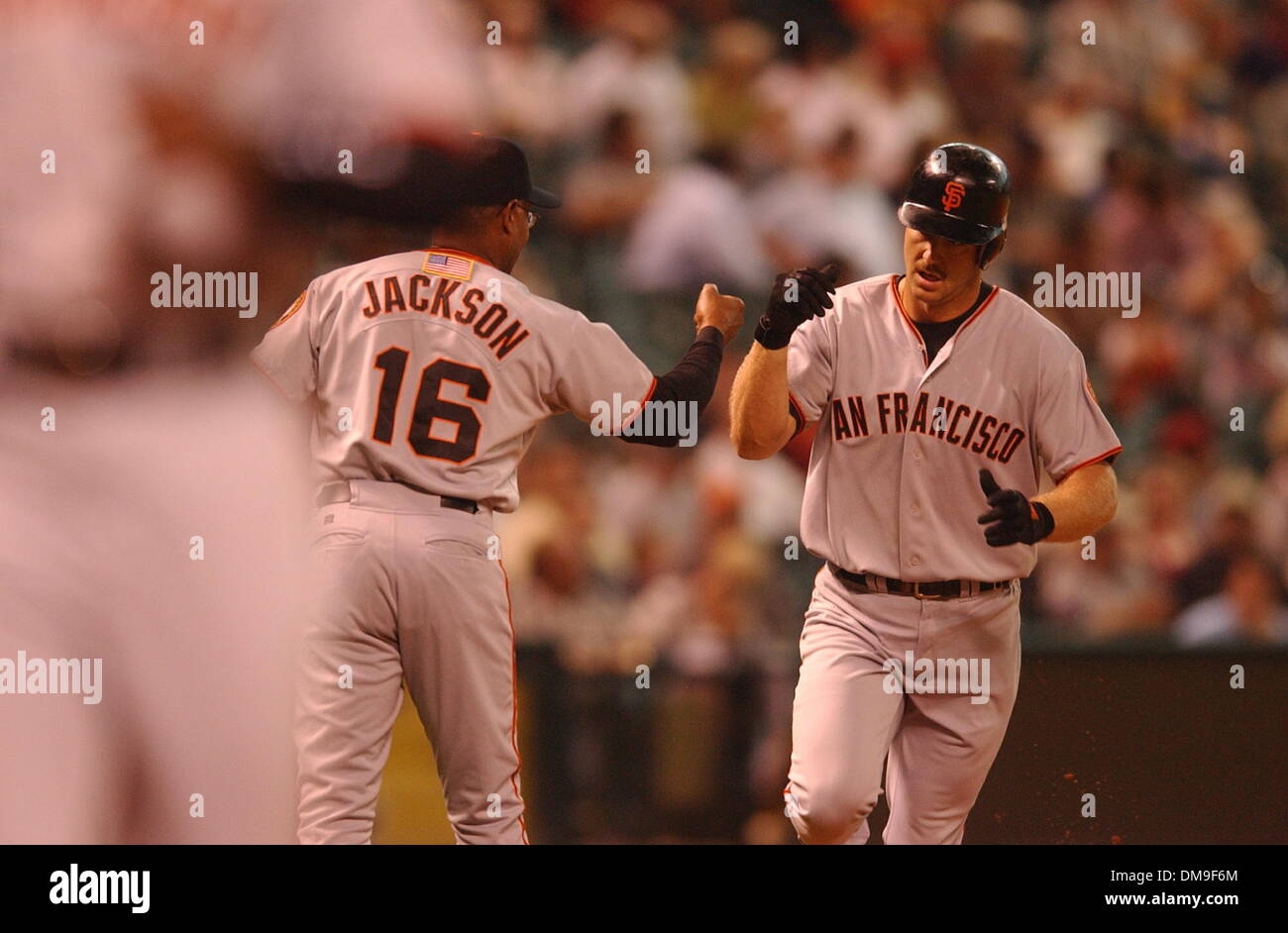 San Francisco Giant Jeff Kent rounds third, and 3rd base coach Sonny  Jackson in the 1st inning after hitting a 2 run homerun giving the Giants a  2-0 lead in the Giants/Astros