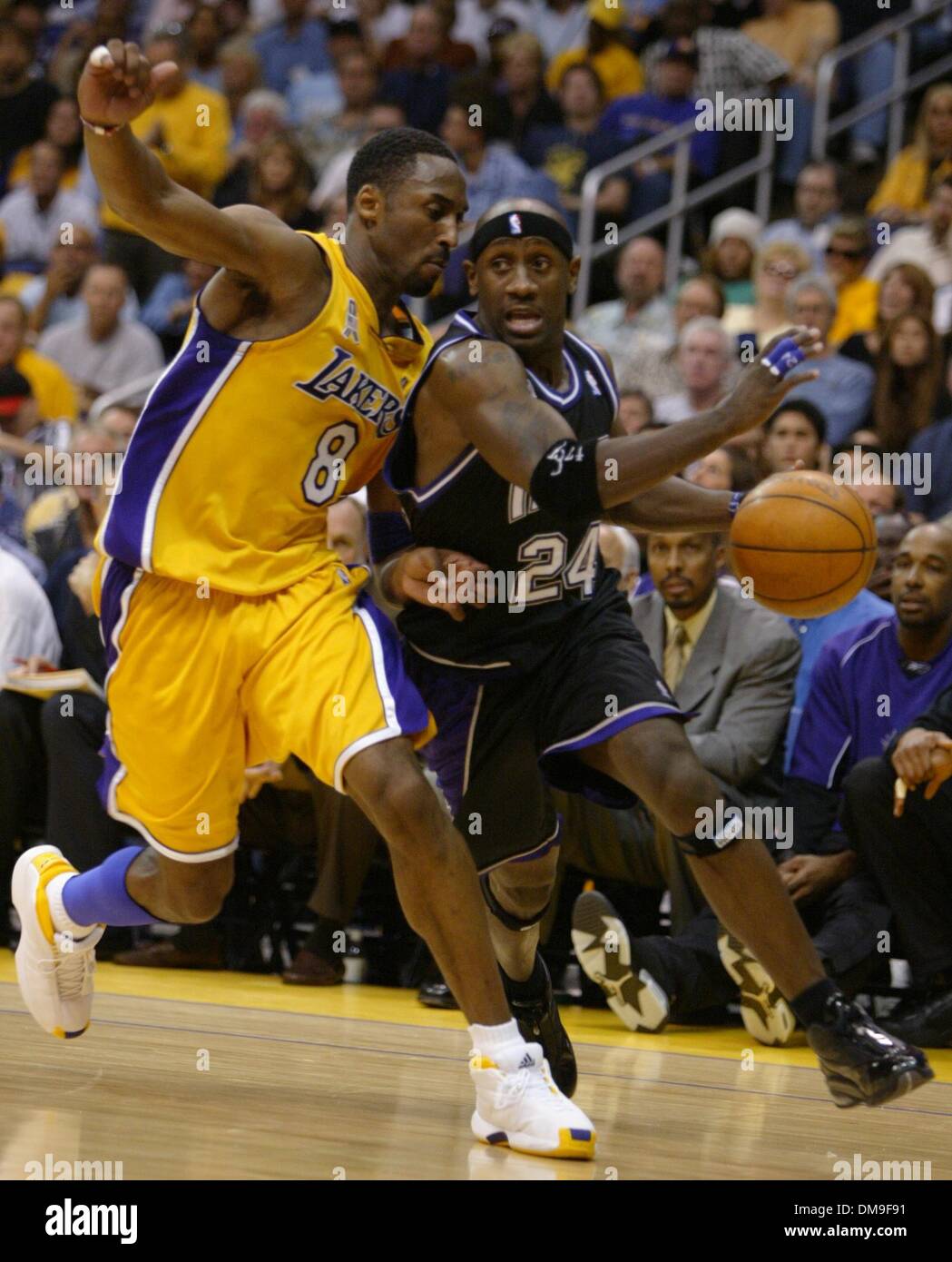 Bobby Jackson drives against Kobe Bryant in the second quarter in game four between the Sacramento Kings and the Los Angeles Lakers in the Western Conference Championships Sunday, May 26, 2002 at Staples Center. Sacramento Bee photograph by Bryan Patrick/ZUMA Press Stock Photo