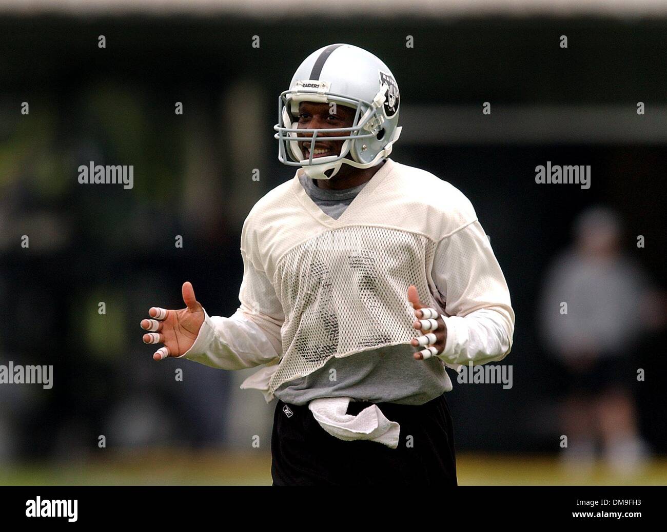 Oakland Raider wide reciever Tim Brown reponds to teammate Jerry Rice ...