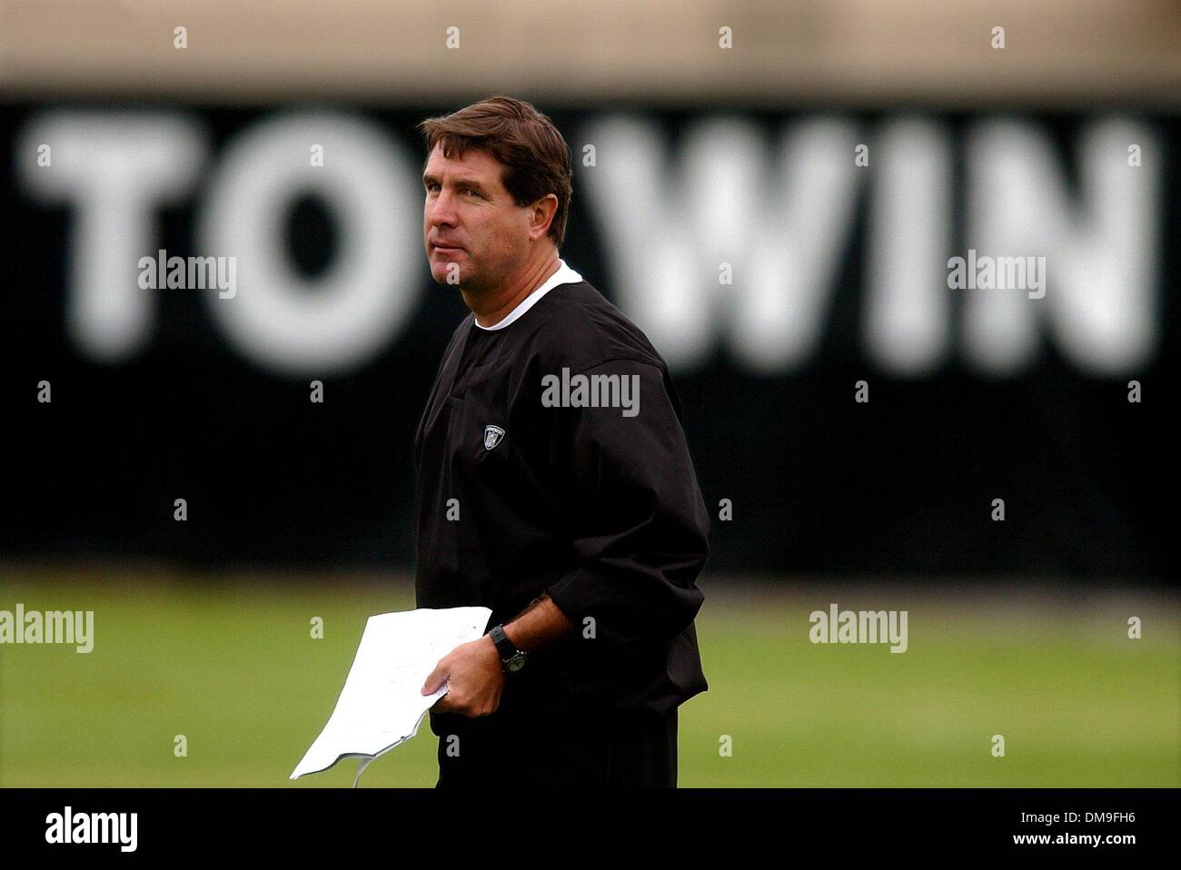 New Oakland Raider head coach Bill Callahan (cq) watches the first day of camp Friday morning at the Oakland Raiders training facility at the Napa Valley Marriott. Sacramento Bee photograph by Jose Luis Villegas July 26, 2002/ZUMA Press Stock Photo