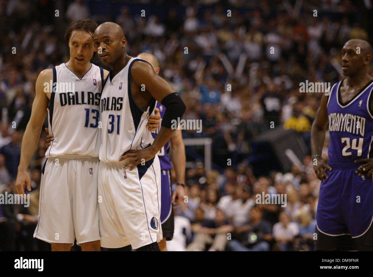 Apr 20, 2005; Sacramento, California, USA; Bobby Jackson is fouled by  Steven Hunter in the 4th quarter of Wednesday nights basketball game  between the Sacramento Kings and Phoenix Suns at Arco Arena.