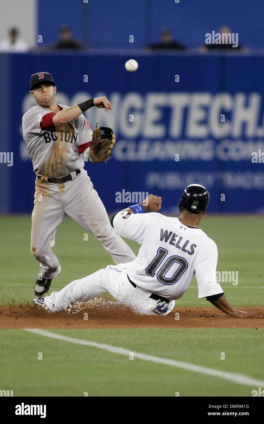 Boston Red Sox first baseman Kevin Millar warms up before the game against  the Toronto Blue Jays at the Rogers Center May 25, 2005 in Toronto, Canada.  The Jays went on to