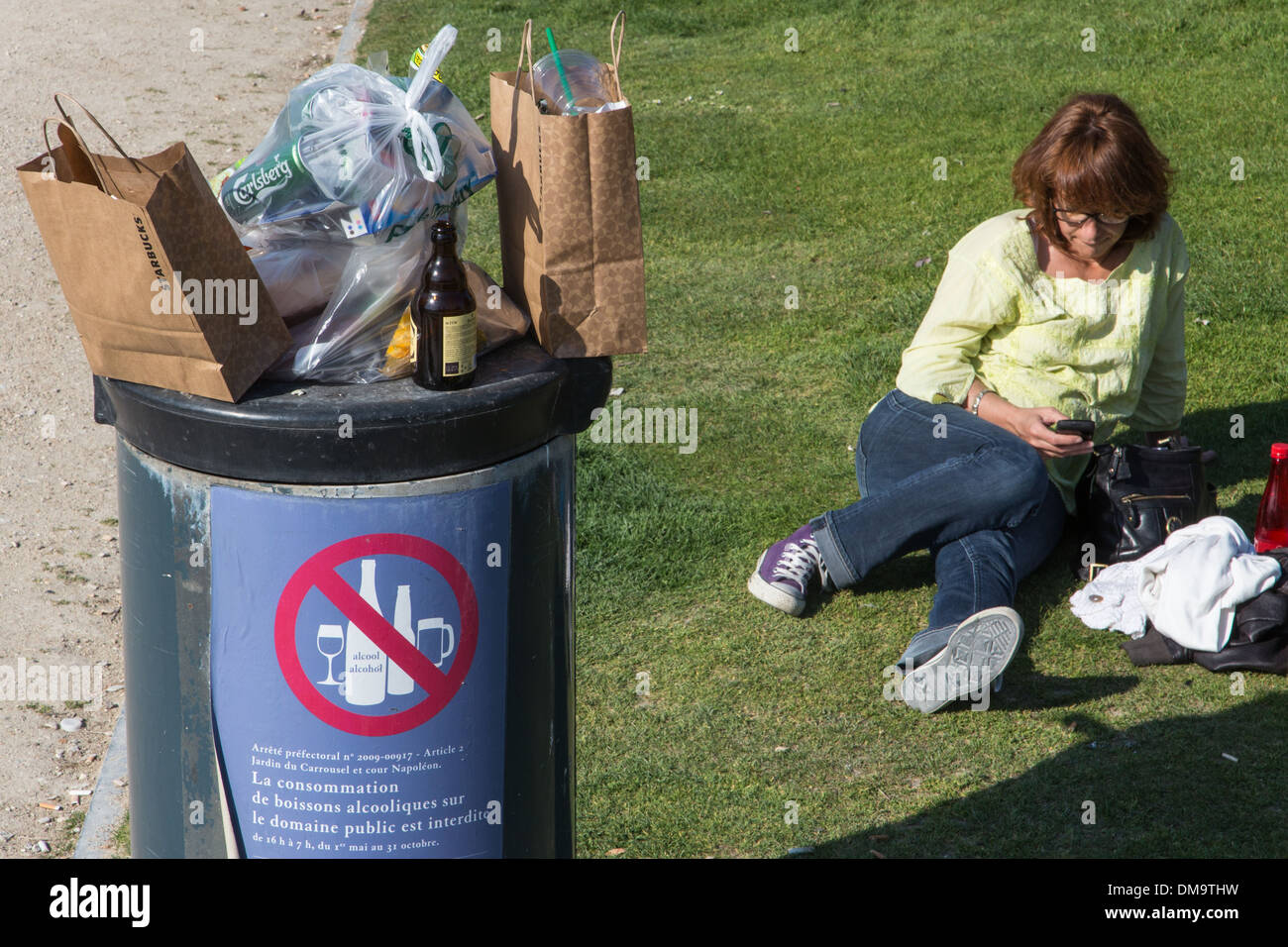 FULL GARBAGE BINS AND BOTTLES OF ALCOHOL, TUILERIES GARDEN