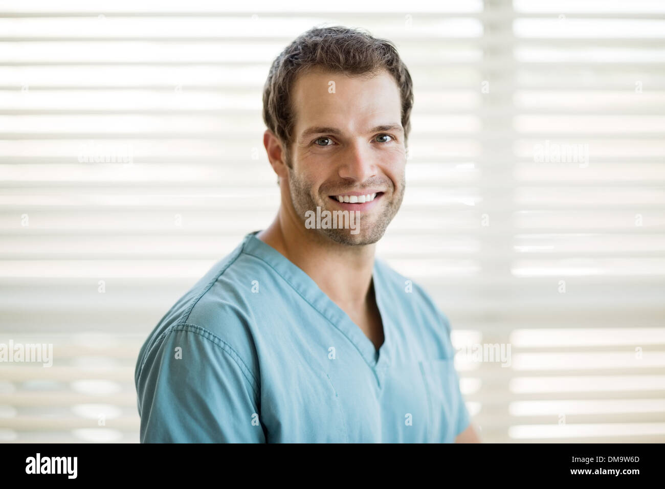 Portrait Of Happy Male Nurse Stock Photo