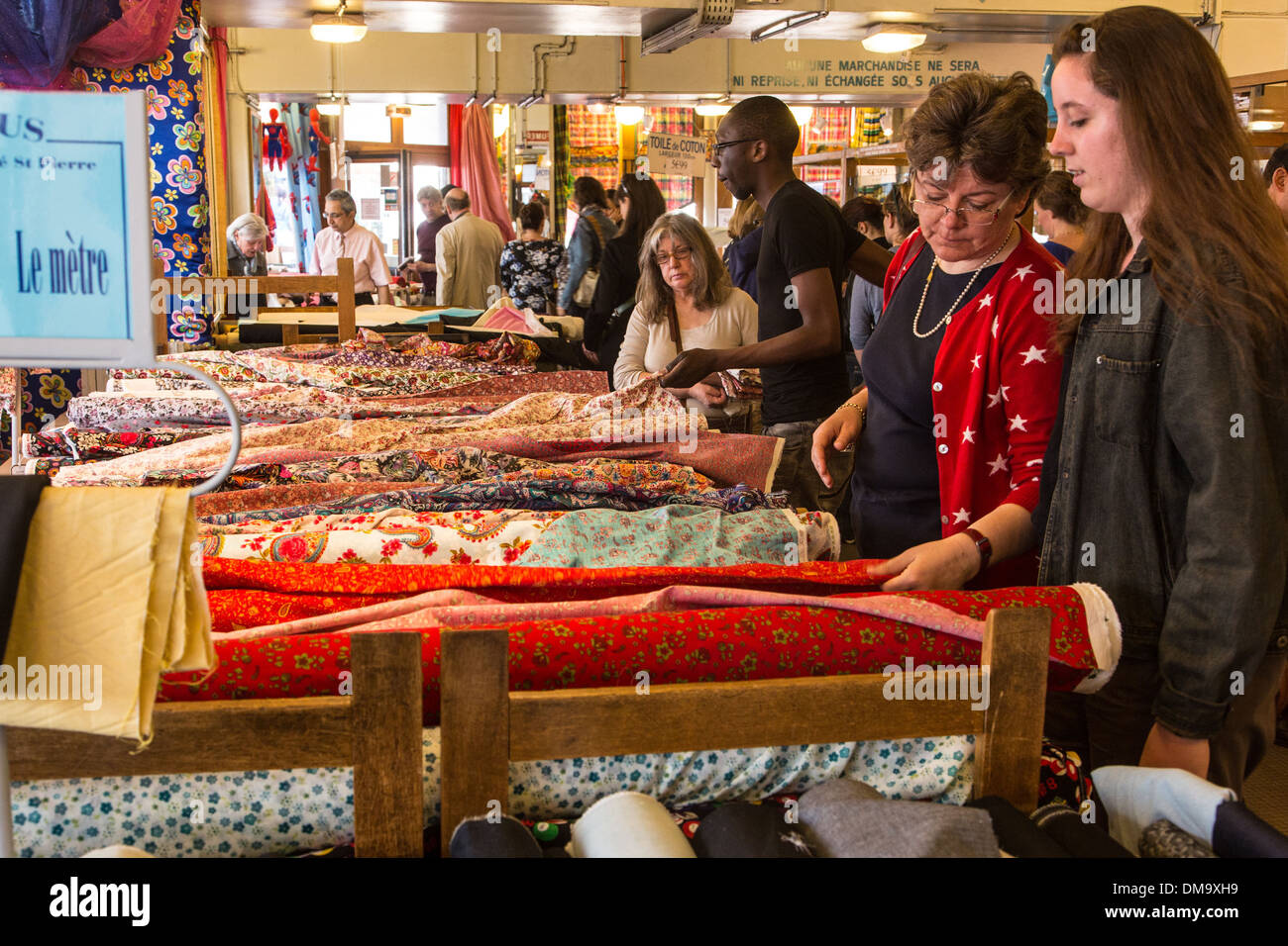 CUSTOMERS IN THE FABRICS STORE, SAINTPIERRE DREYFUS MARKET, RUE LIVINGSTONE, 18TH