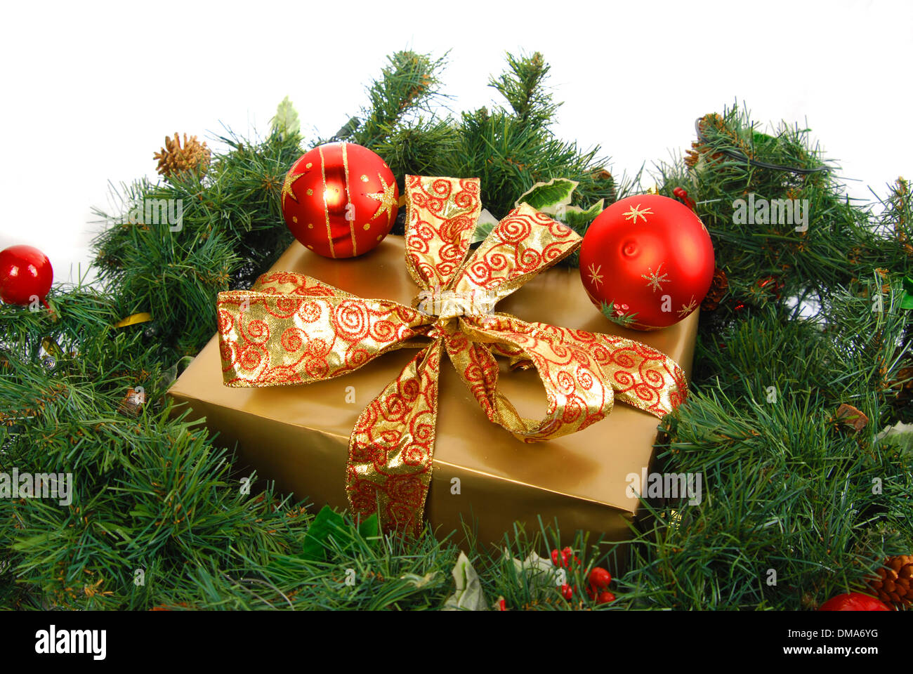 pezent under a Christmas tree on a white background Stock Photo
