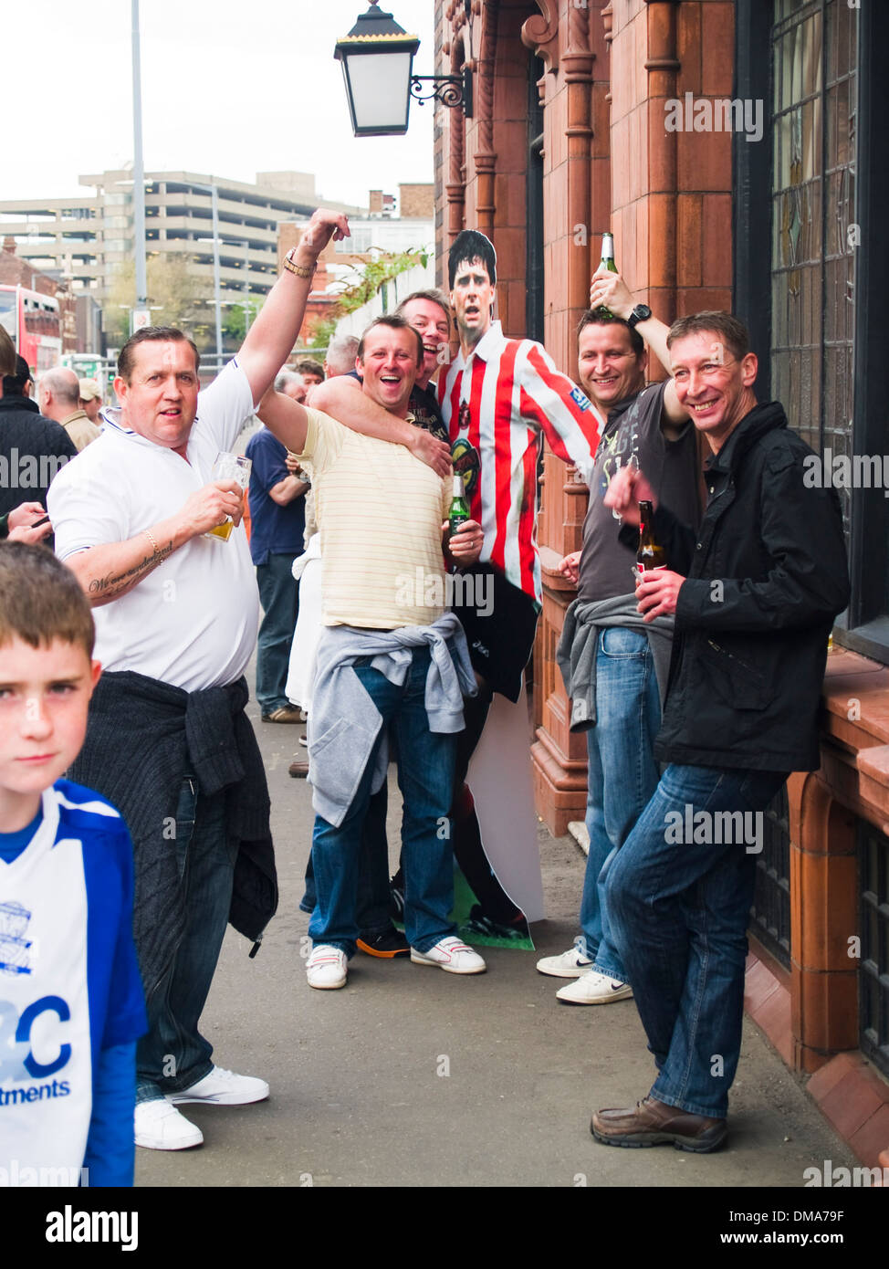 Sunderland fans drink with a cardboard cut-out of former striker, manager and chairman Niall Quinn Stock Photo