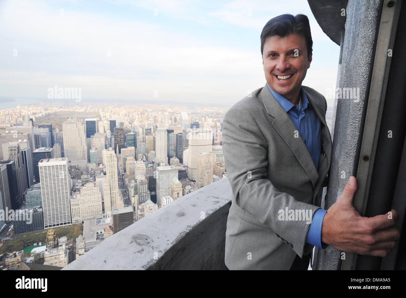 Nov 04, 2009 - Manhattan, New York, USA - New York Yankee great and four-time World Series champion TINO MARTINEZ, looking from the 103rd floor parapet, lights and tours the Empire State Building to wish the Bronx Bombers good and celebrate the playing of Game 6 against the Philadelphia Phillies at Yankee Stadium tonight.  (Credit Image: Â© Bryan Smith/ZUMA Press) RESTRICTIONS:  *  Stock Photo