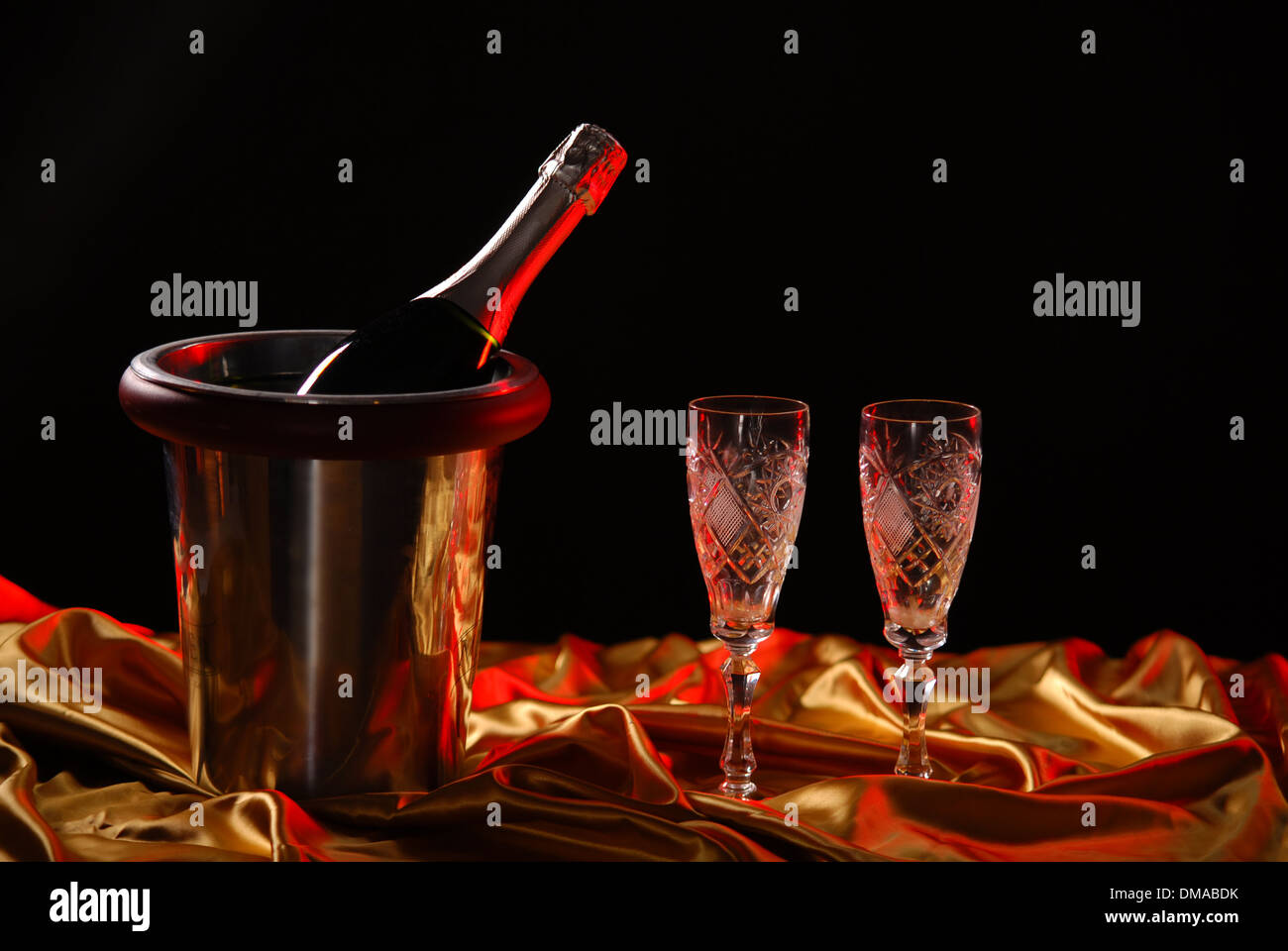 pouring champagne and fireworks on a dark background Stock Photo
