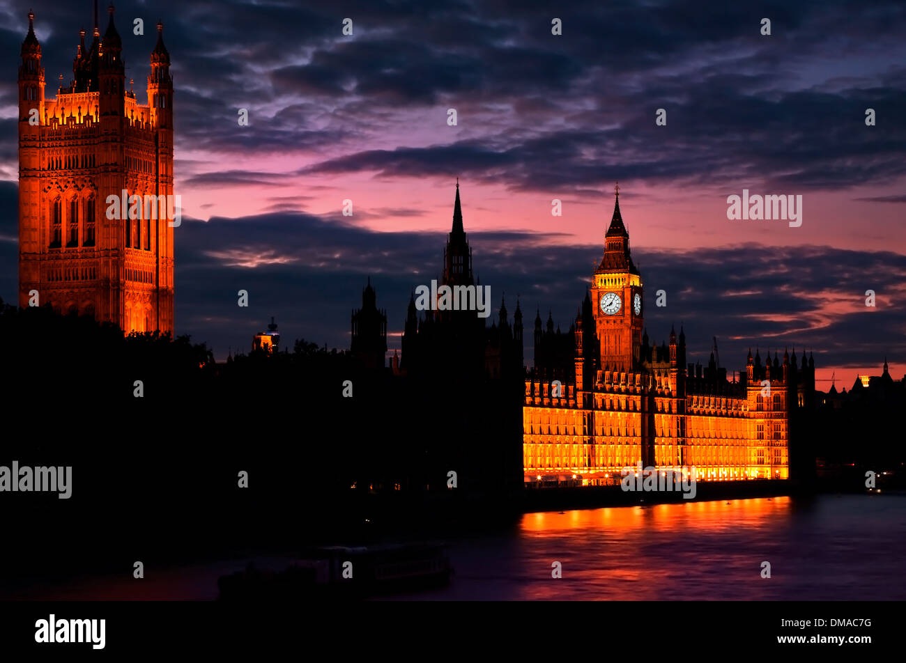 dusk shot of house of parliament over river thames london Stock Photo