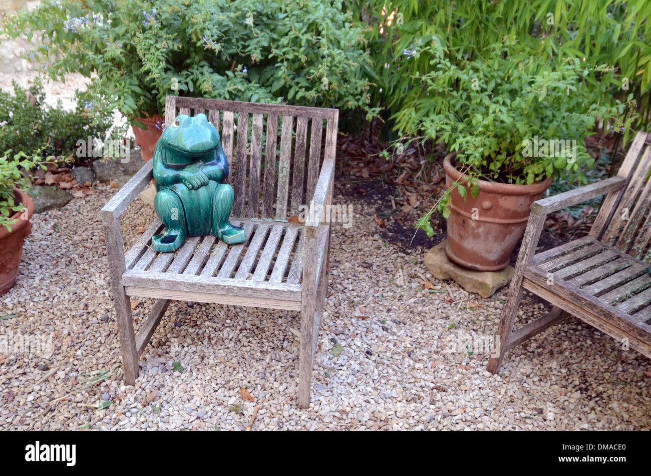 Garden Chair & Ornamental Frog Château d'Arnajon Le Puy-Sainte-Réparade Provence France Stock Photo