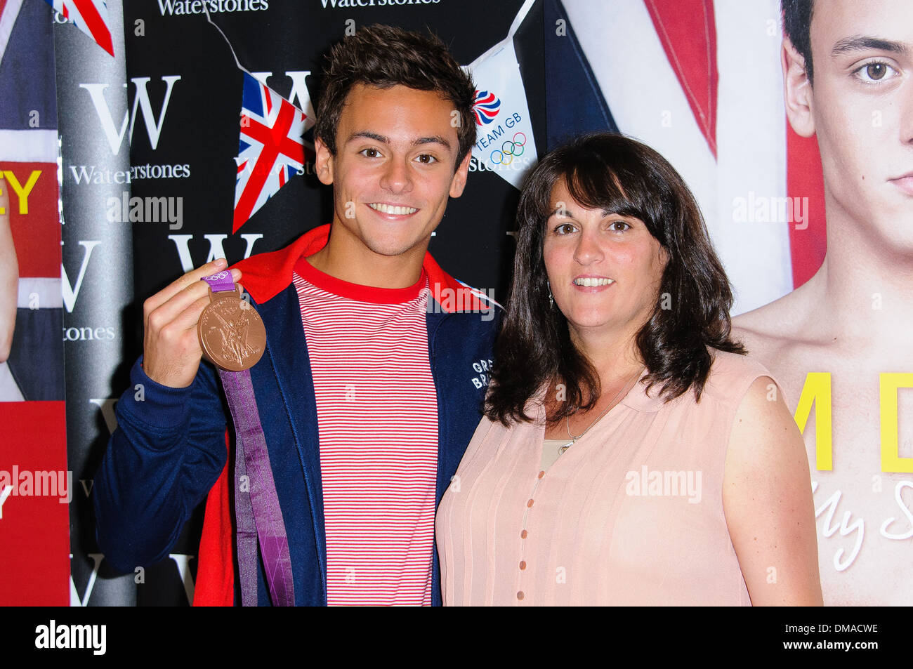 Tom Daley and his mother Debbie Daley Olympic medalist Tom Daley signs  copies of his autobiography 'My Story' at Bluewater Stock Photo - Alamy