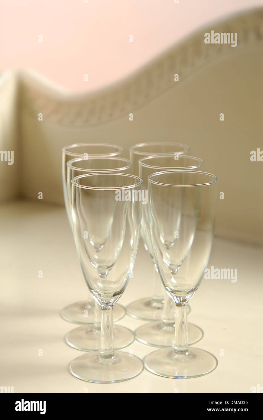 Empty champagne glasses on a light background Stock Photo