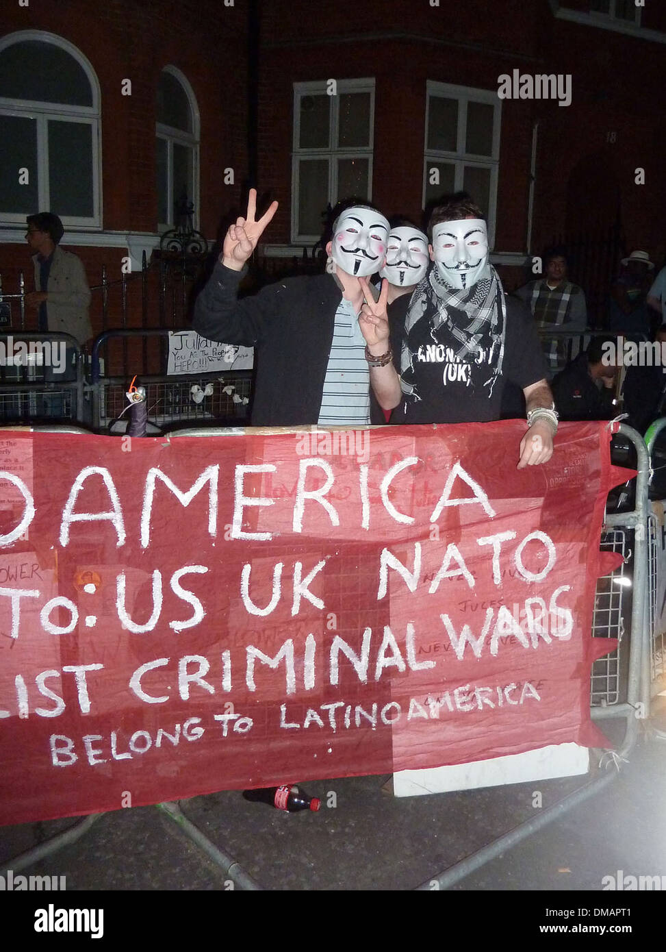 Posters and placards left by protesters outside Ecuadorian Embassy
