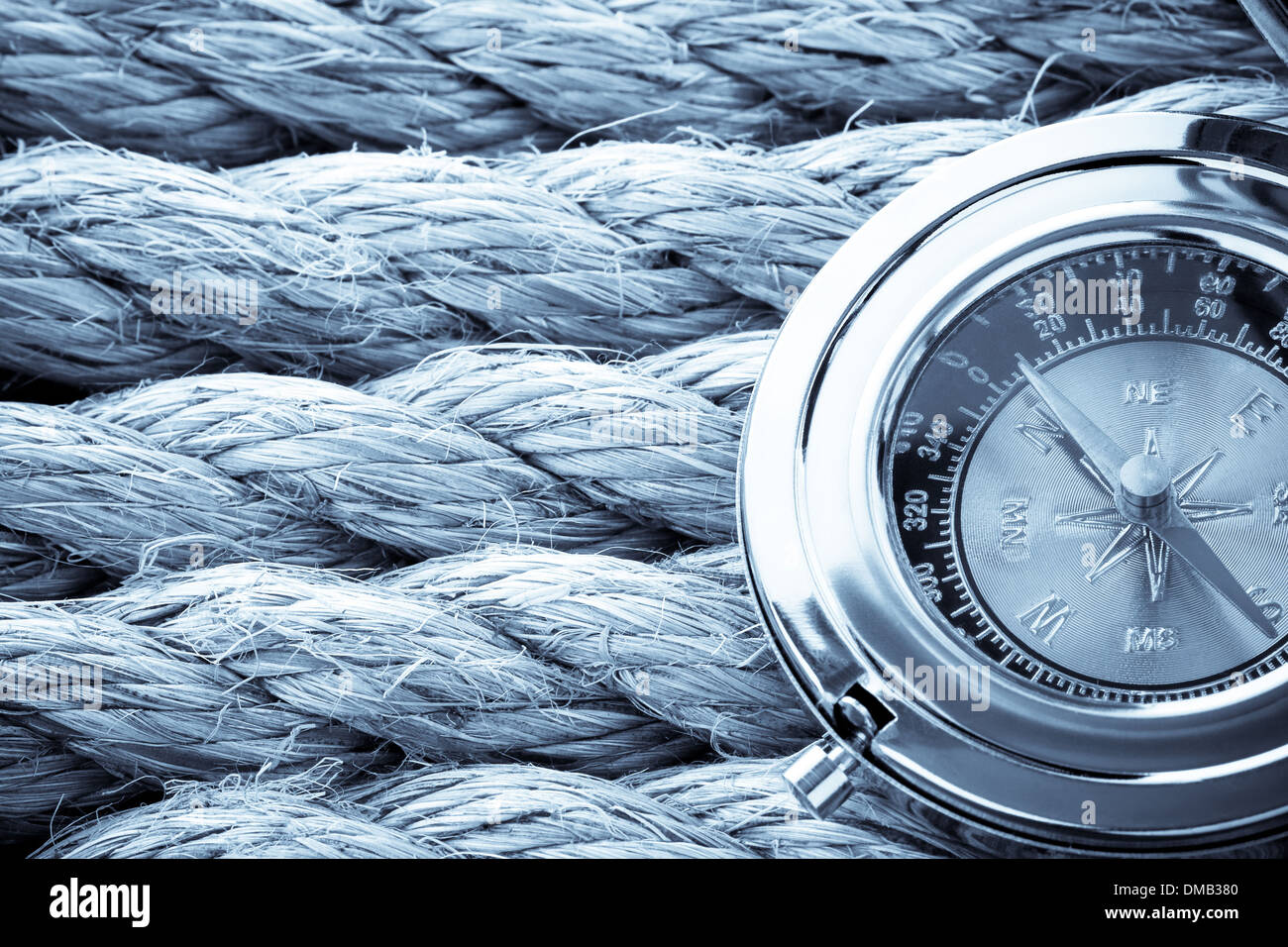 ship ropes and compass Stock Photo - Alamy