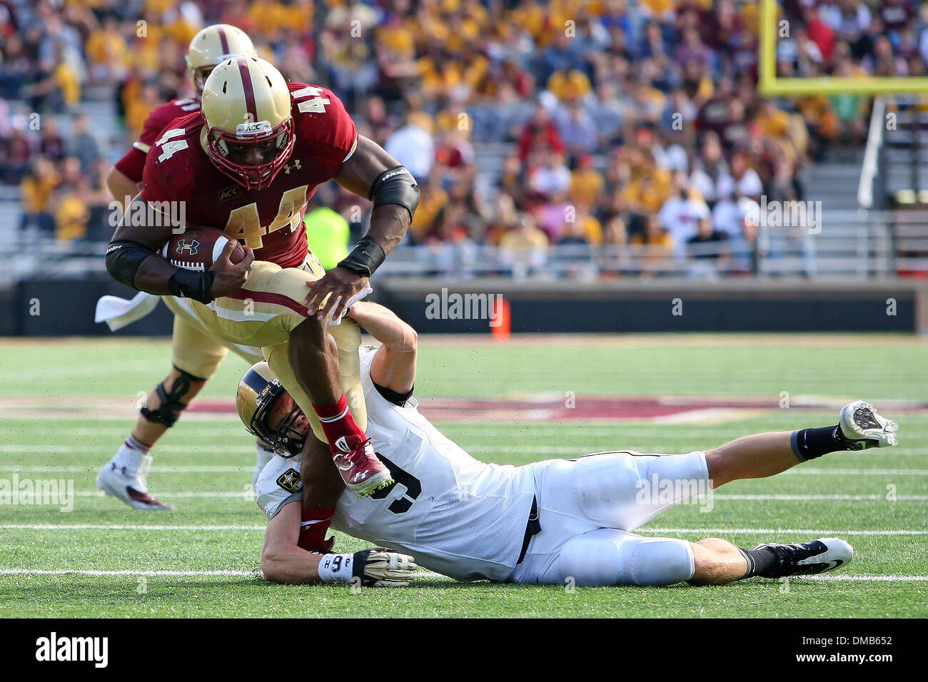 Chestnut Hill, Massachusetts, USA. 5th Oct, 2013. December 12, 2013; FILE PHOTO - Boston College Eagles running back Andre Williams (44) has been named the winner of the 2013 Doak Walker Award. The award is given to college football's leading rusher. PICTURED - October 5, 2013; Army Black Knights defensive back Hayden Pierce (9) tackles Boston College Eagles running back Andre Williams (44) during the NCAA football game between the Boston College Eagles and Army Black Knights at Alumni Stadium. Boston College defeated Army 48-27. Anthony Nesmith/CSM. © csm/Alamy Live News Stock Photo