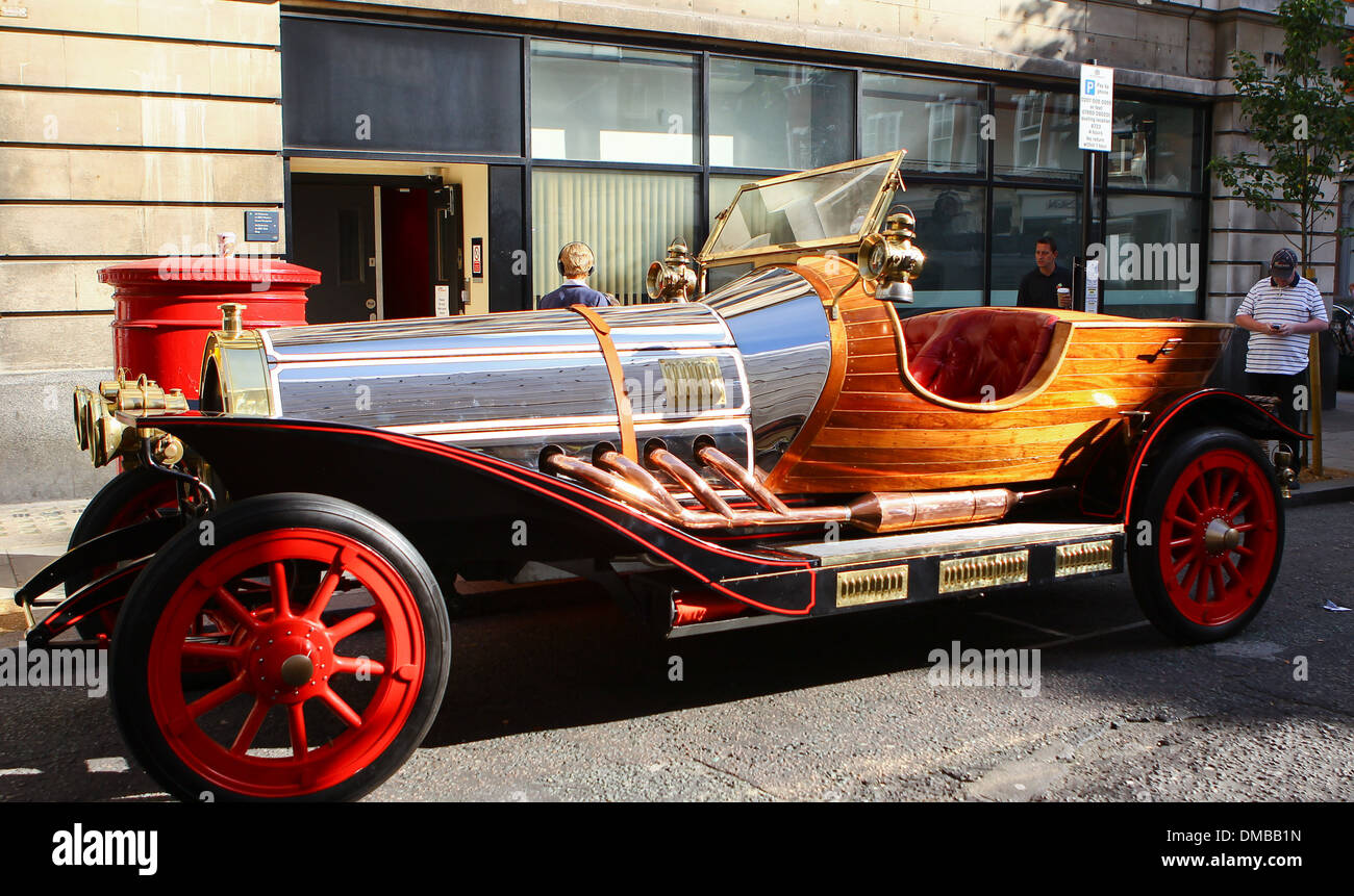 Atmosphere Chris Evans drives original Chitty Chitty Bang Bang car outside BBC Radio 2 studios Evans bought iconic car for a Stock Photo