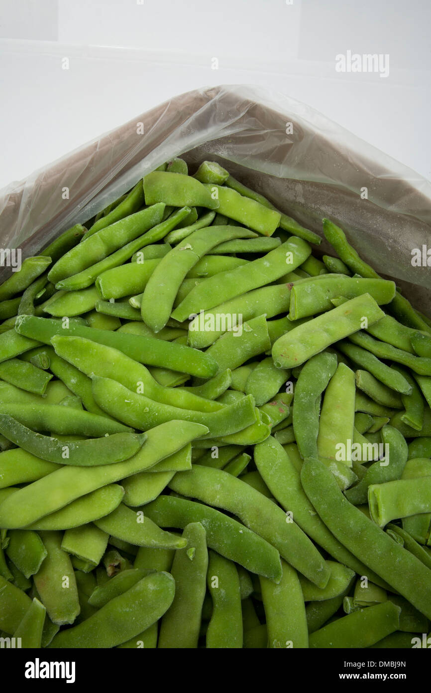 Frozen peas beans lettuce cabbage products laid on ice to be showcased