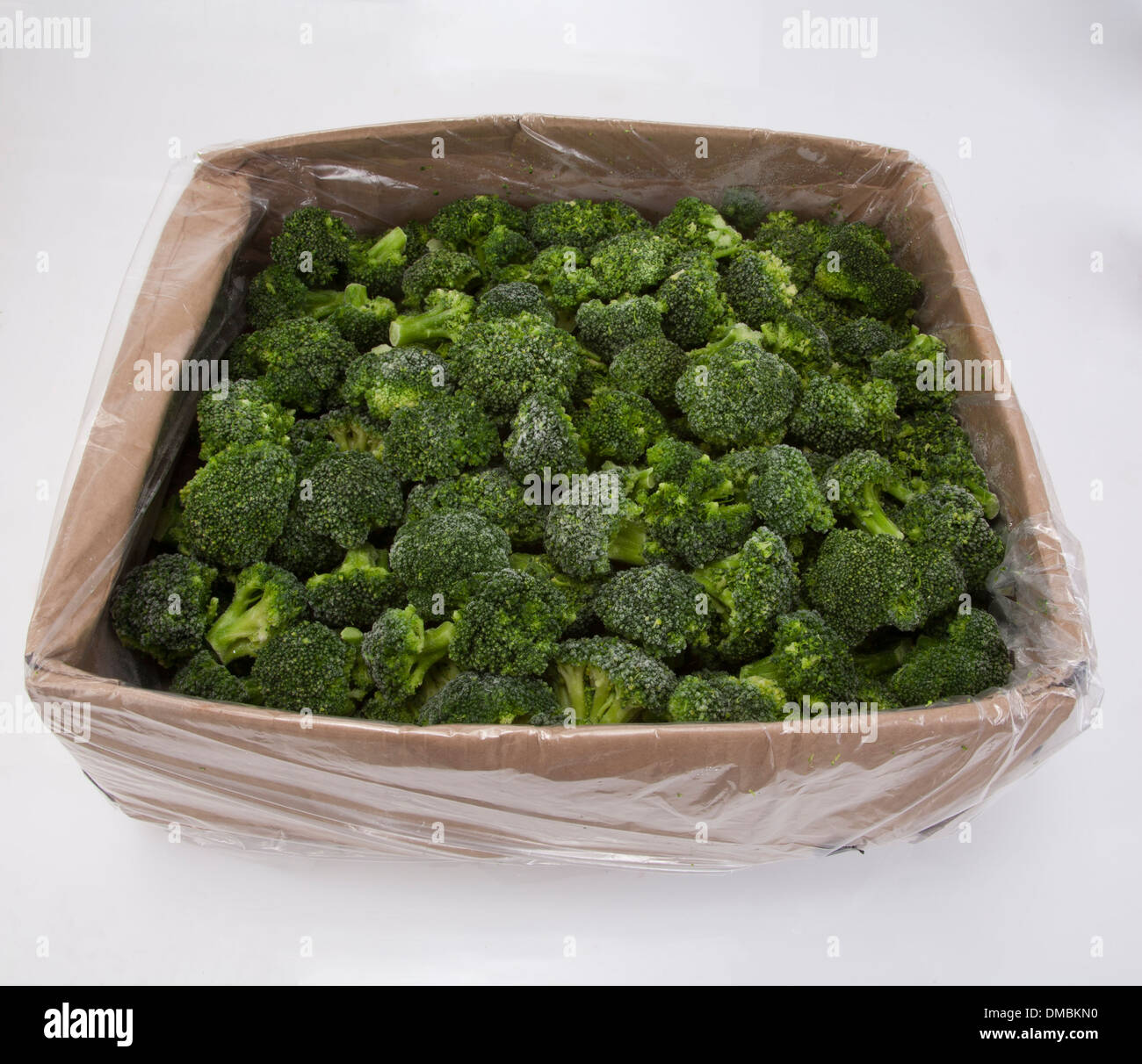 Frozen peas beans lettuce cabbage products laid on ice to be showcased