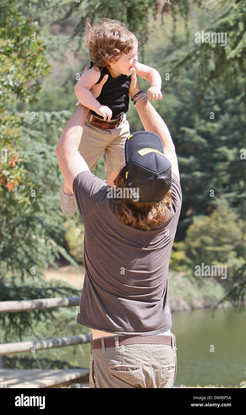 Rodger Berman holds his son Skyler Rachel Zoe and husband Rodger Berman