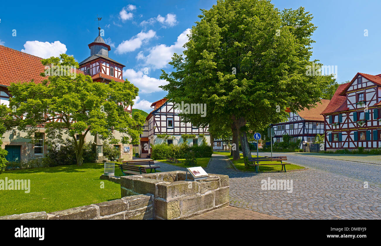 Village green with church in Altenburschla, Wanfried, Werra-Meissner district, Hesse, Germany Stock Photo