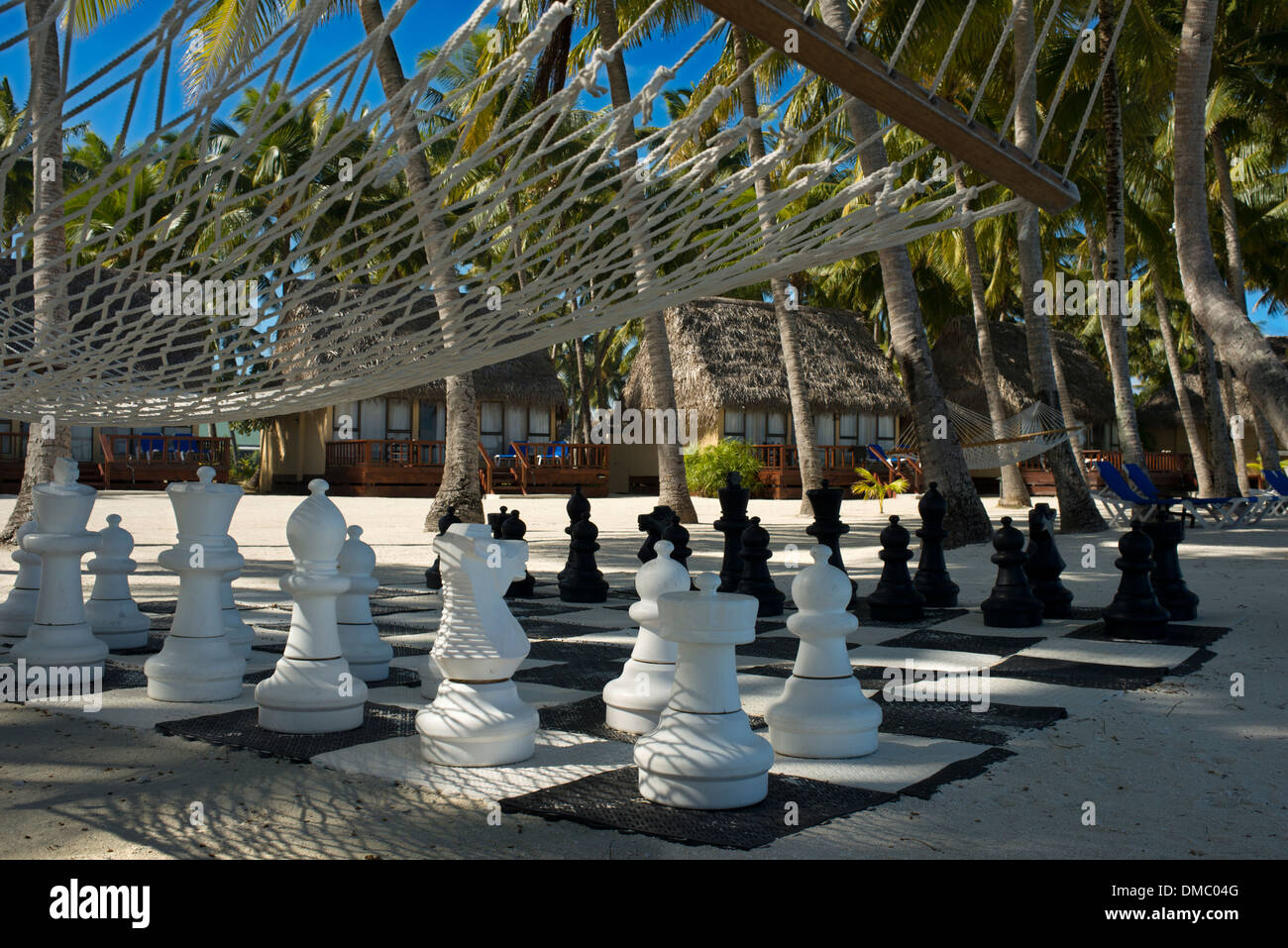 Aitutaki. Cook Island. Polynesia. South Pacific Ocean. Giant chess set on the beach of the Aitutaki Lagoon Resort & Spa Hotel. Stock Photo