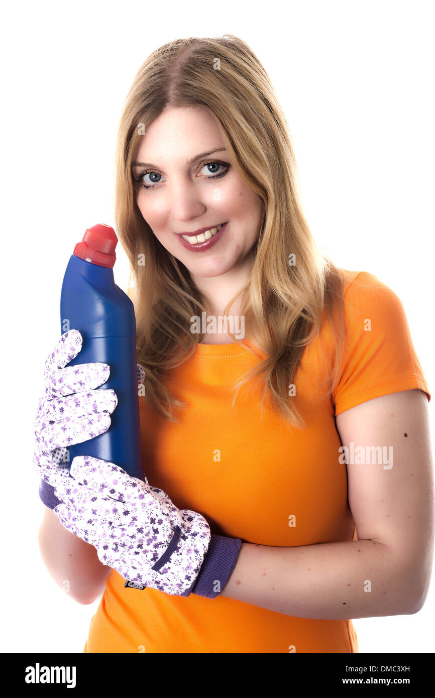 Young Woman or Housewife Wearing Protective Gloves Holding A Bottle of Cleaning Bleach To