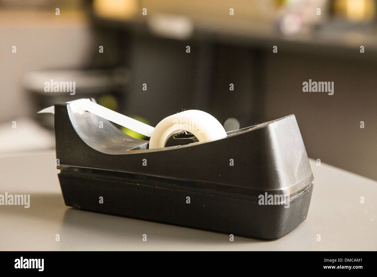 Tape dispenser at work Stock Photo Alamy