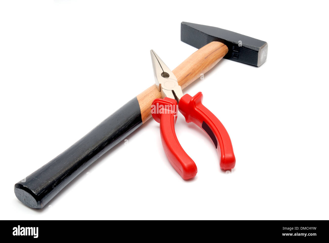 Tools collection Hammer with wooden handle and flatnose pliers with