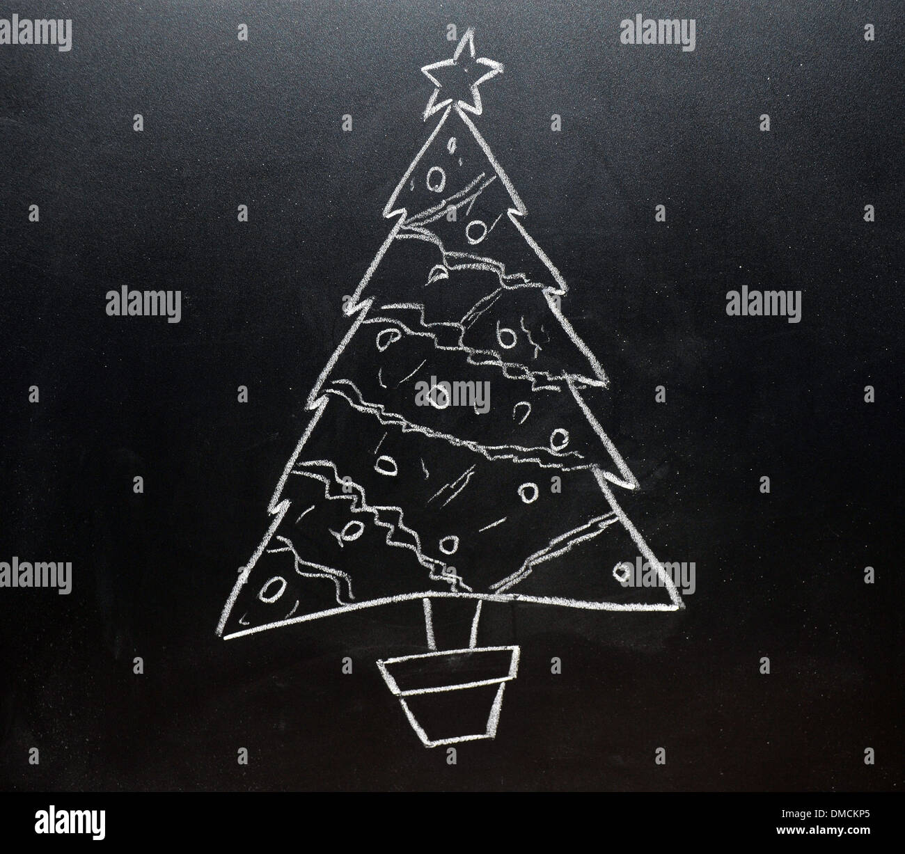 A christmas tree drawn on a blackboard in white chalk Stock Photo