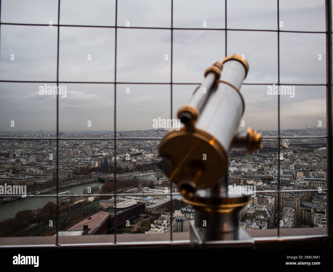 Paris city view from the top of the Eiffel tower with binocular Stock Photo