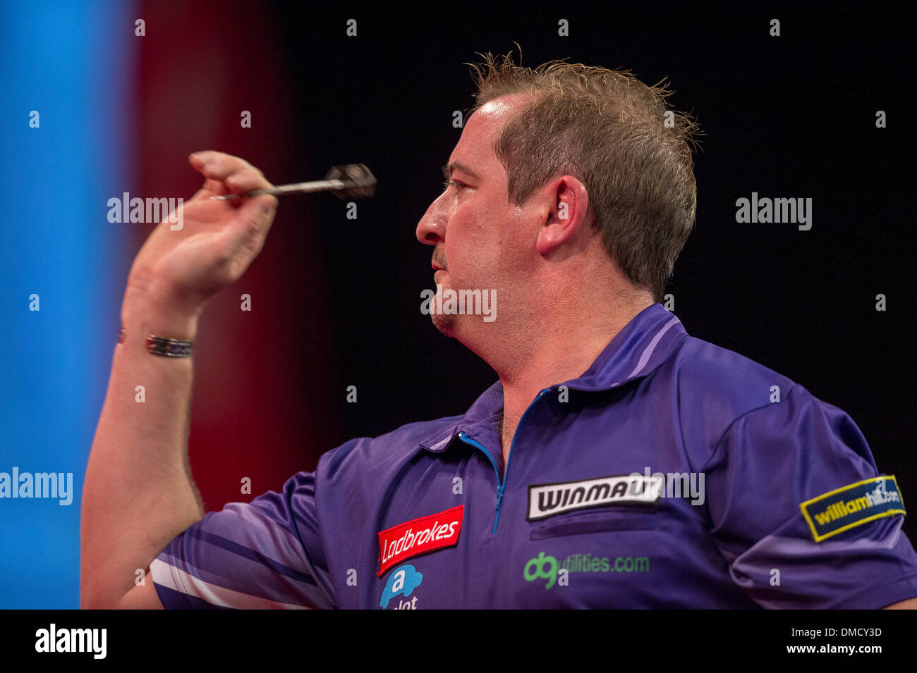 London, UK. 13th Dec, 2013. Dean Winstanley (England) in action against Richie Burnett (Wales) [28] during the Ladbrokes World Darts Championships from Alexandra Palace. Credit:  Action Plus Sports/Alamy Live News Stock Photo