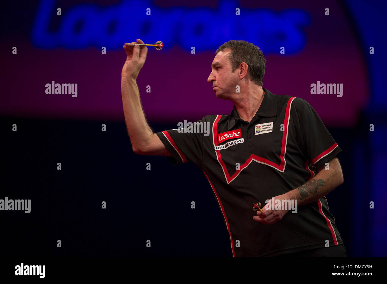 London, UK. 13th Dec, 2013. Richie Burnett (Wales) [28] in action against Dean Winstanley (England) during the Ladbrokes World Darts Championships from Alexandra Palace. Credit:  Action Plus Sports/Alamy Live News Stock Photo