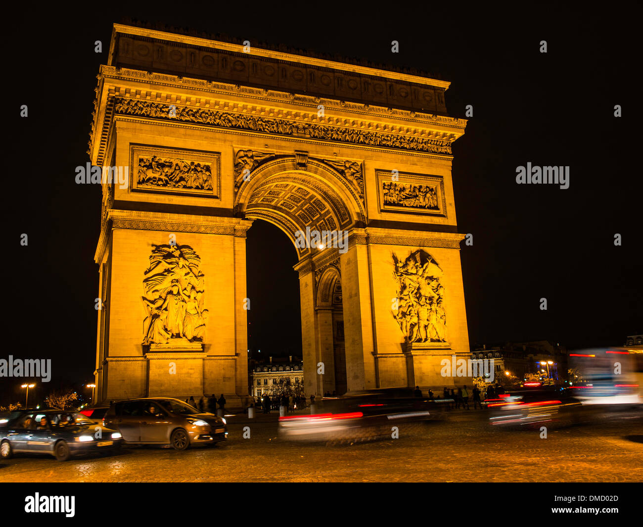 Arc du Triomphe at night Stock Photo